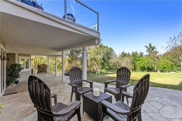 DOWNSTAIRS DECK OUTSIDE OF 3RD BEDROOM