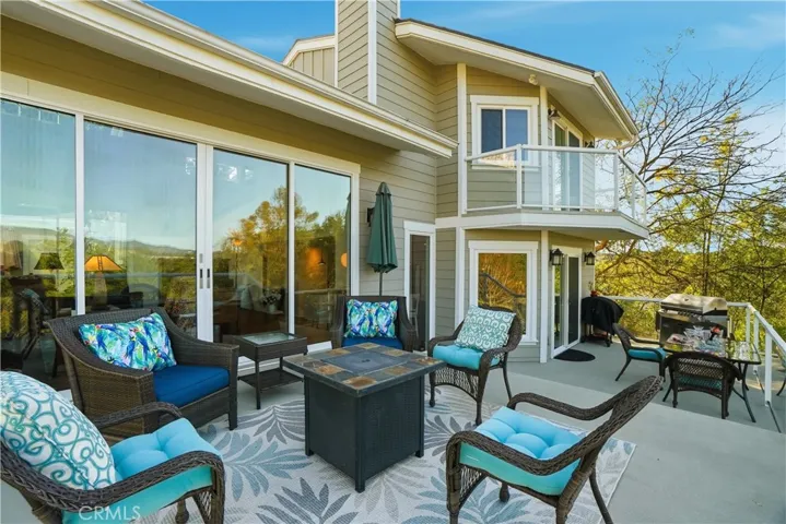 DECK OFF MAIN FLOOR WITH VIEW OF SADDLEBACK MOUNTAIN