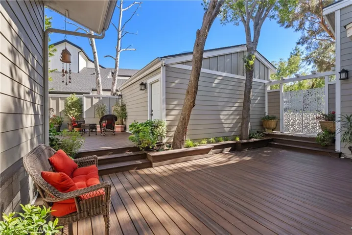 VIEW FROM FRONT DOOR OF DECK AND 2 CAR GARAGE