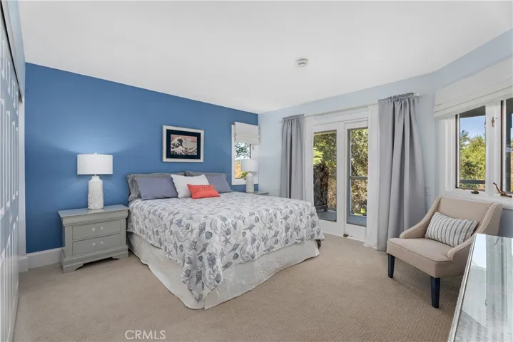 3RD BEDROOM DOWNSTAIRS WITH DOOR TO BACK PATIO