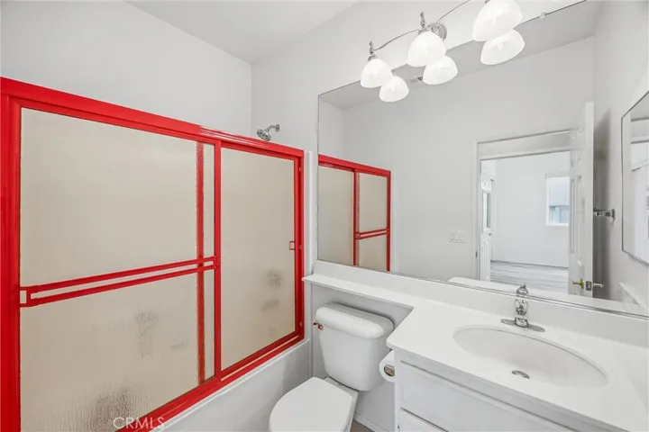 Tub in shower, guest bath.