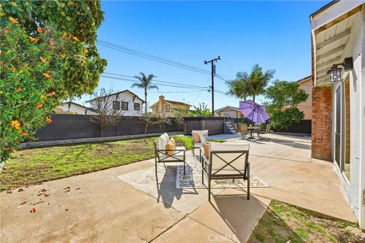 Spacious yard with entertainment areas, play areas and more.