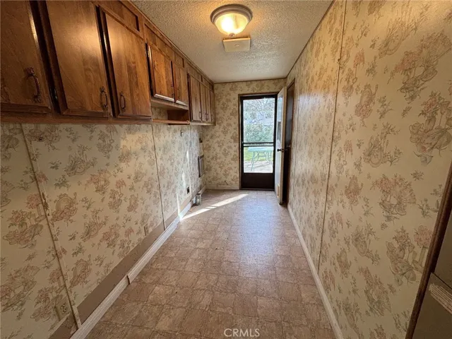 Laundry room to backyard area.