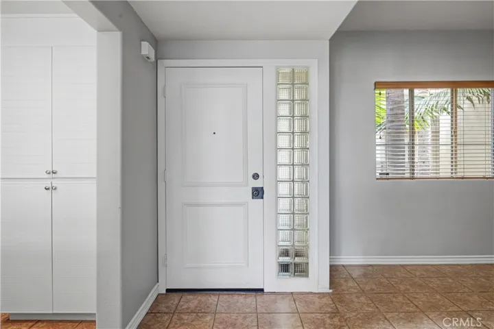 Front door with view of den/flex space