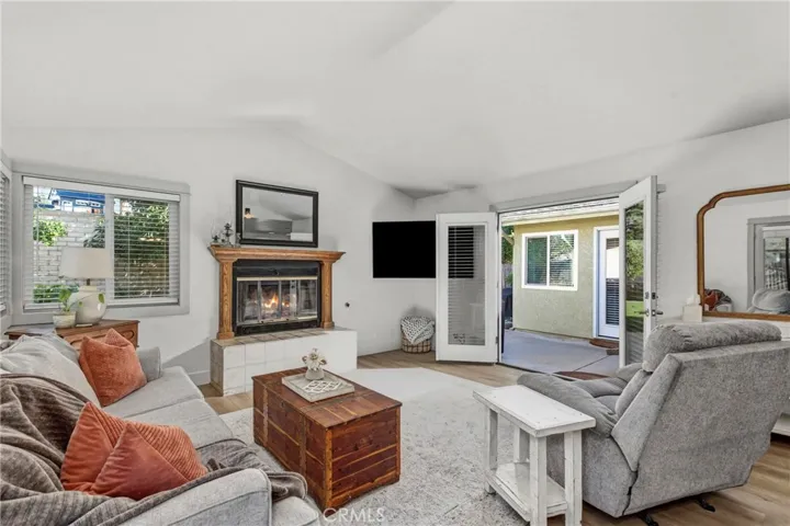 Cozy living Room with fireplace and french doors
