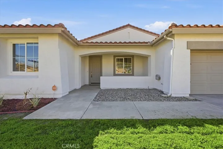 FRONT W COVERED /PATIO