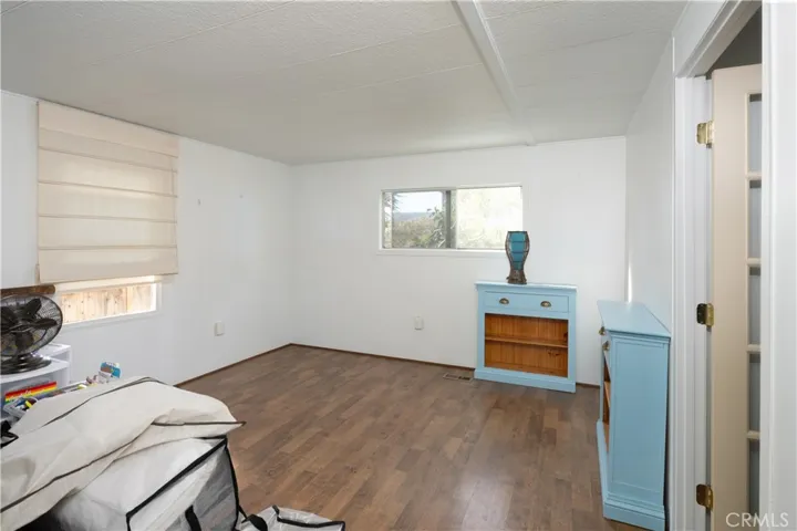 Primary bedroom with an attached bathroom