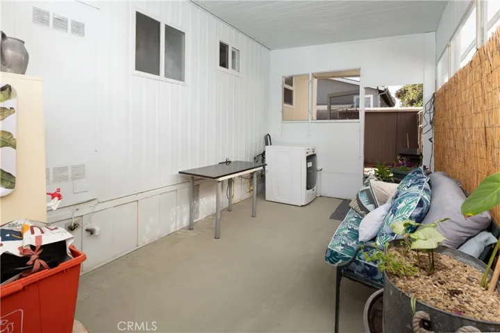 Storage area behind the carport
