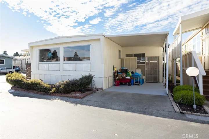 3395 S Higuera Street #16 Has two large picture windows that allow lots of light in the main living area.