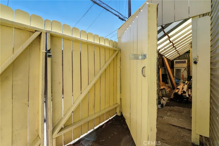 Storage area at the rear of the property off the alley.