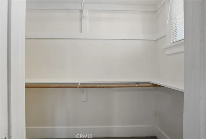 Rear bedroom with walk in closet  - vacant home #734.