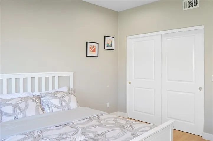 A quick stop at the main floor bedroom and bath before we head upstairs. The 4th bedroom in the main house offers gorgeous mountain views, fabulous flooring, recessed lighting, and is pre-wired for a ceiling fan and a TV (like all of the bedrooms).