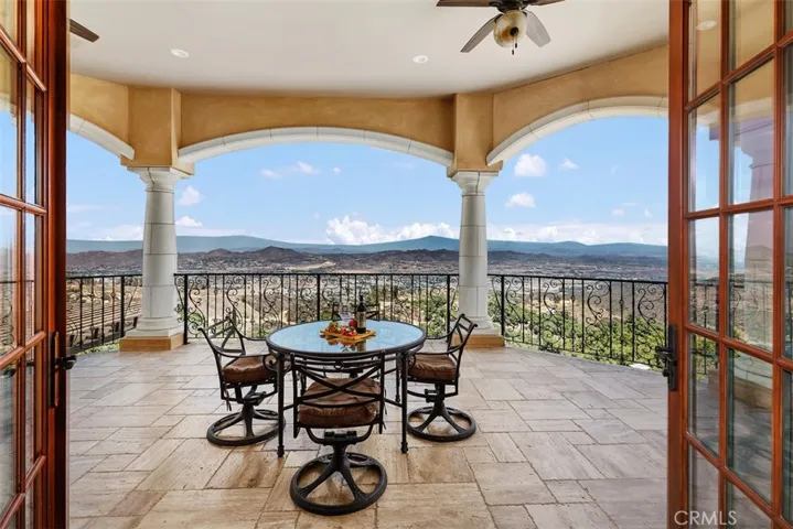Master suite covered private patio facing east.