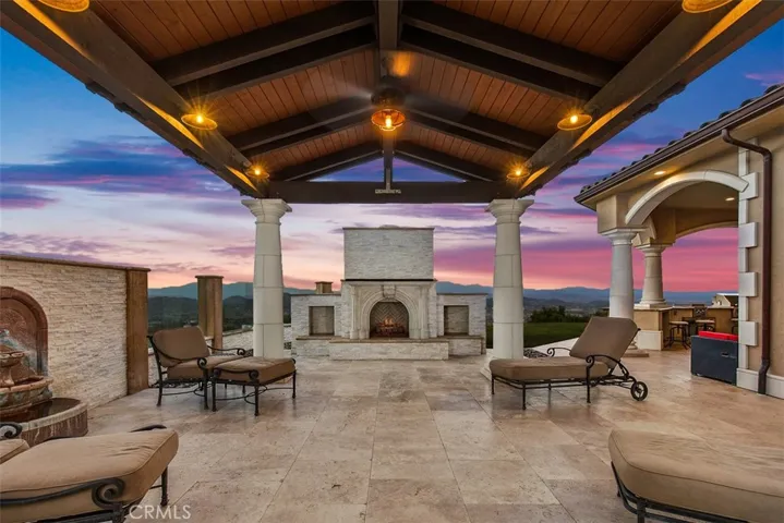 Private covered second patio with views.