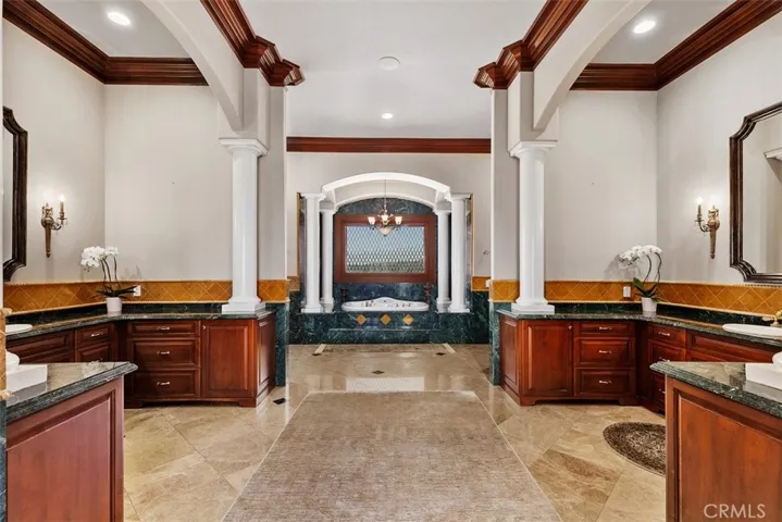 Master suite dual showers and vanities with matching sinks