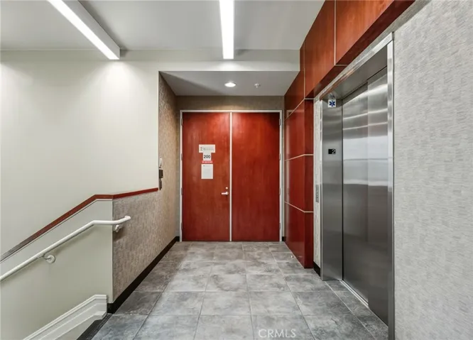 Elevator and stairs upstairs