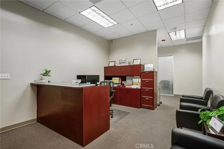 Private reception area for upstairs suite with 4 offices, conference room.  REF S4