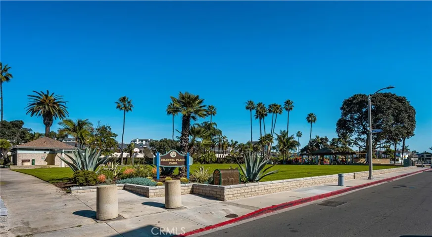 Channel Place Park with BBQ, basketball court, picnic tables, playground, and bay view.