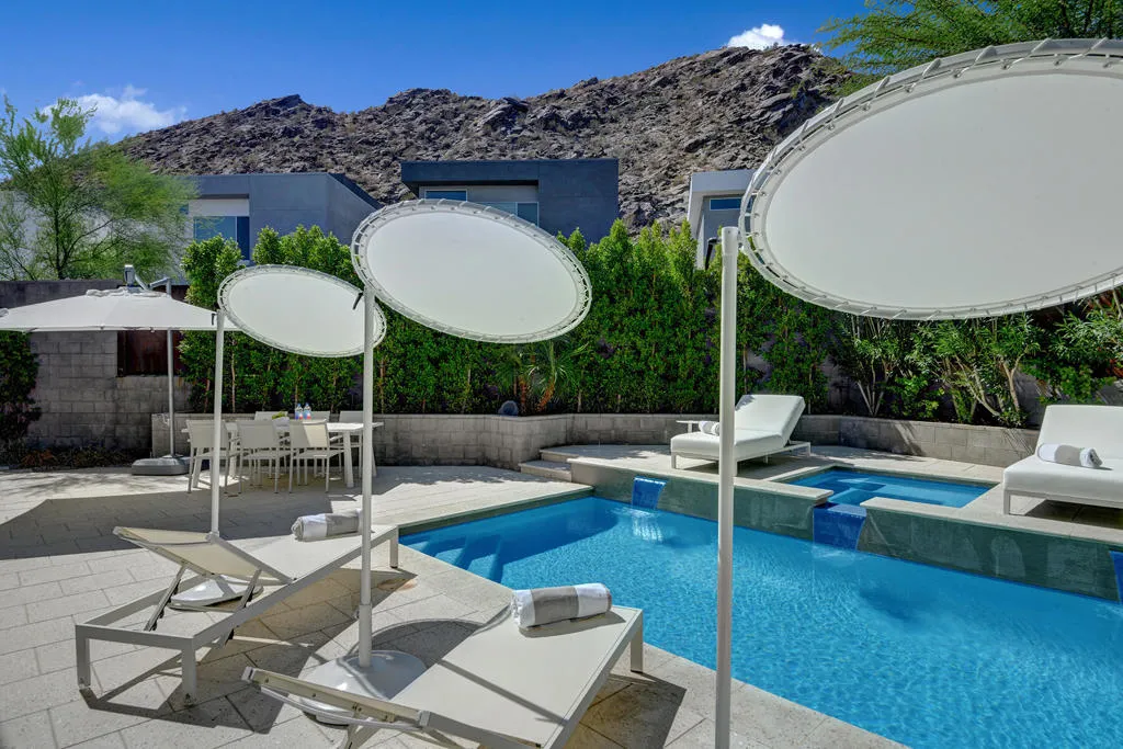 CHAISES TO POOL AND MOUNTAINS MLS