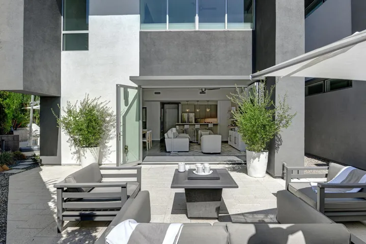 BACK PATIO TO LIVING AND KITCHEN MLS