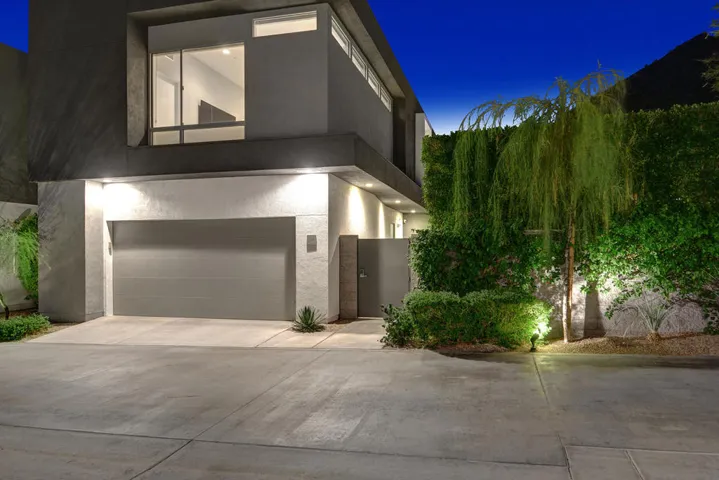 FRONT OF UNIT NIGHT MLS