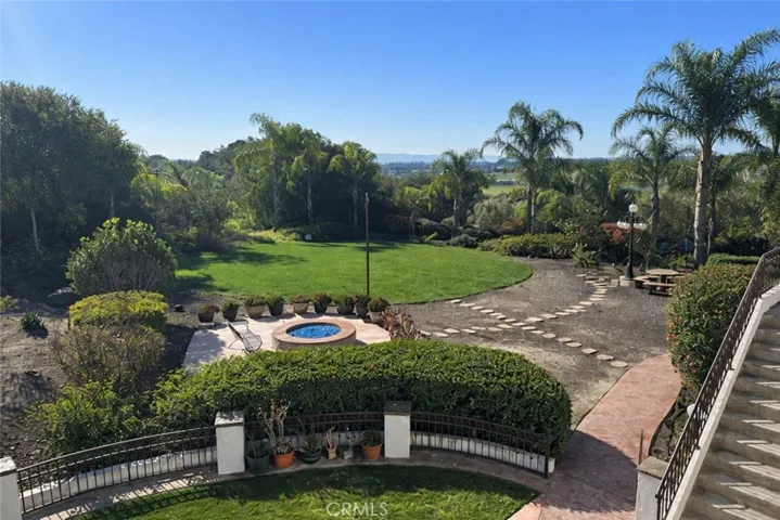 View of Fire-pit & side lawn