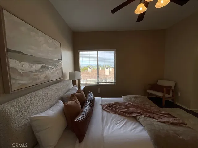 Primary bedroom with view.