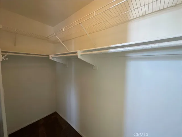 Primary walk-in closet.