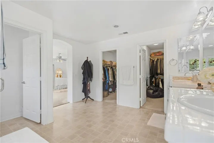 Master bathroom + walk-in closet