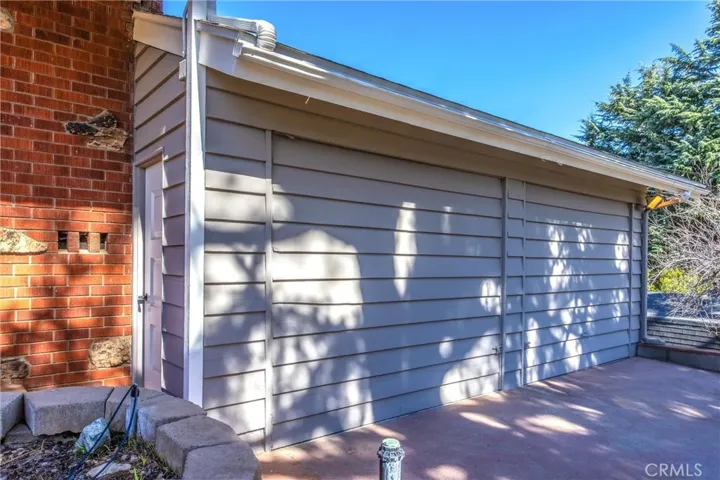 Two car garage doors intact.