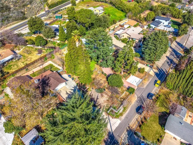 Parking and RV parking behind gates. Road paved.