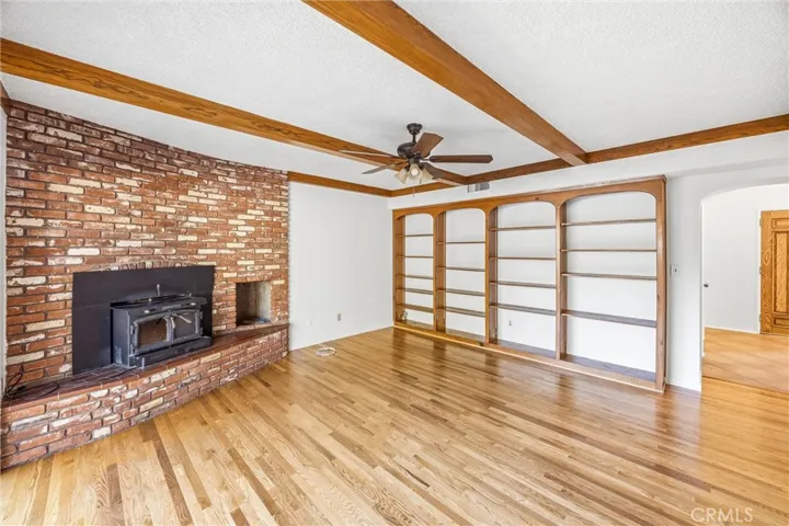 Built in bookshelves and FP in family room