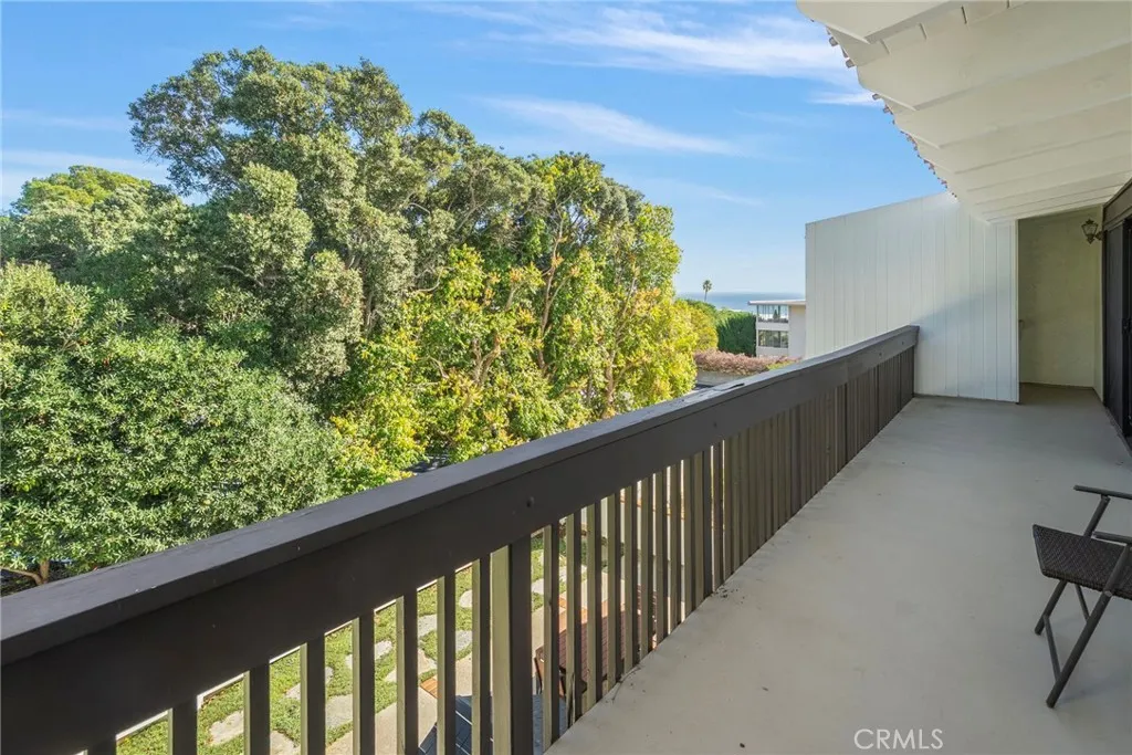 Covered Balcony in Back with an Enclosed Stairwell to access all three levels. It too features Ocean Views.