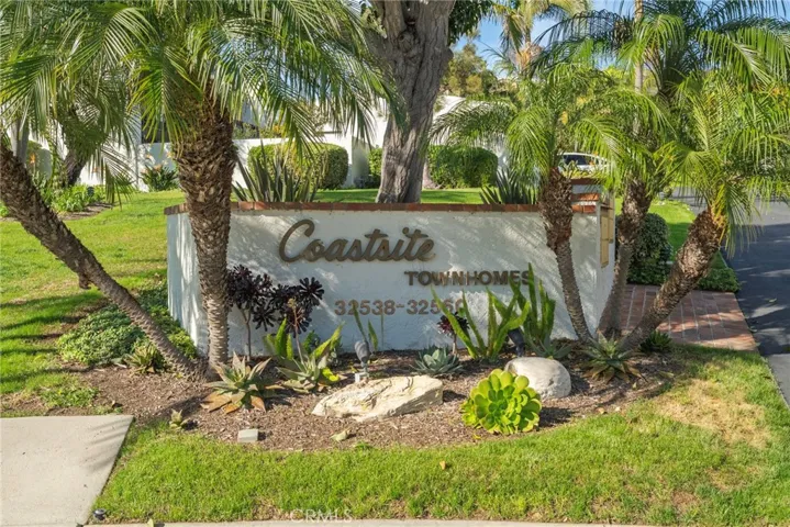 This Home is located by this Sign and along aDriveway at the beginning of Coastsite Drive.