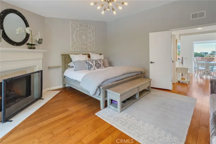 Another View of the Primary with a gas log fire[lace and connection toward the beautiful ocean views on the third level.