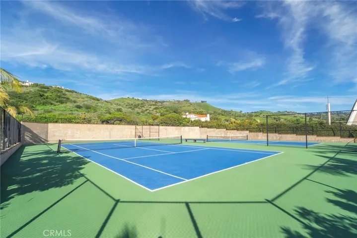 Two Tennis Courts with Pastoral Hill Views.