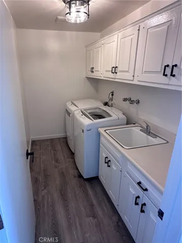 Third Floor Laundry with sink and countertop.