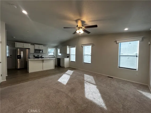 Living room/dining room facing kitchen