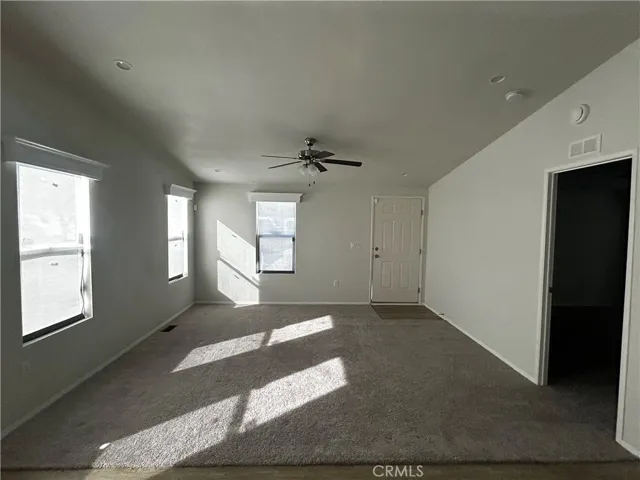 Living room/dining room facing front door