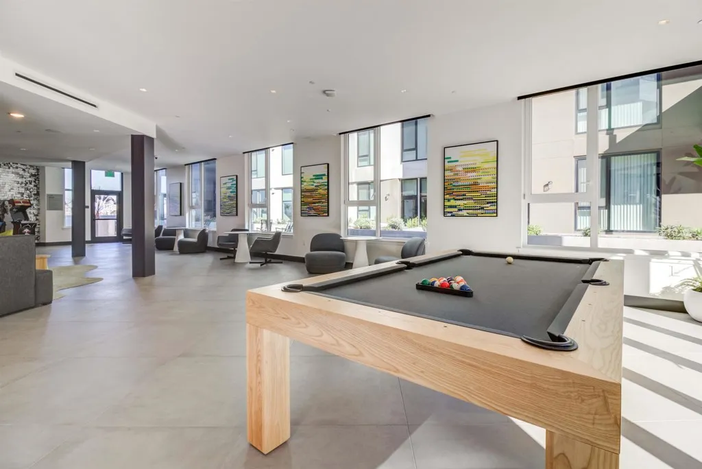 Playroom featuring pool table, healthy amount of natural light, recessed lighting, and light tile patterned flooring