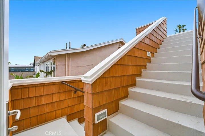 Exterior Staircase at second level, up to the roof top, down to ground level or head in to 2nd floor hallway