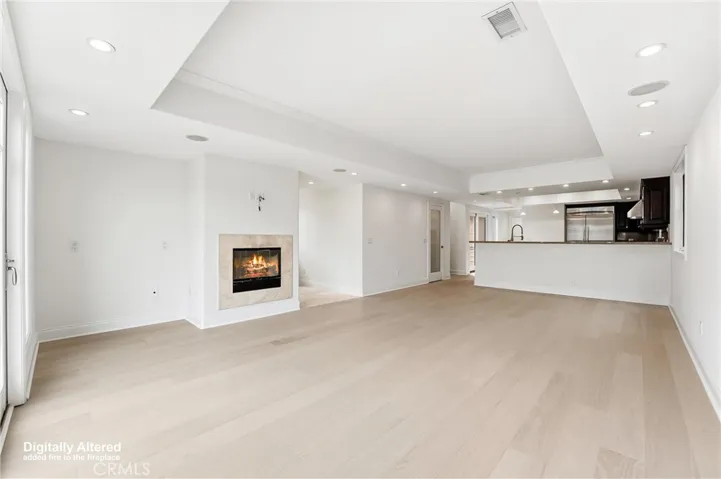 View across the large family room to ktichen