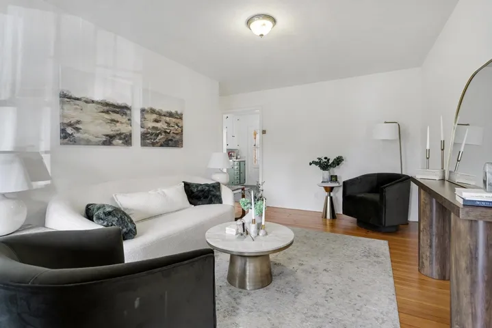 Living room featuring light wood-style floors