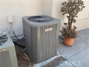 Clean and accessible exterior central cooling unit.