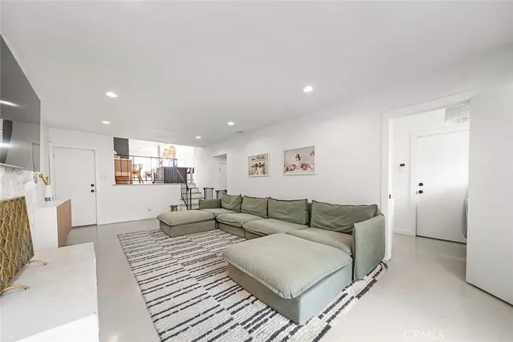 Downstairs Lounge-Like Living Area with Fireplace - View 4