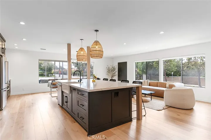 Never miss a moment when entertaining with this open concept design!