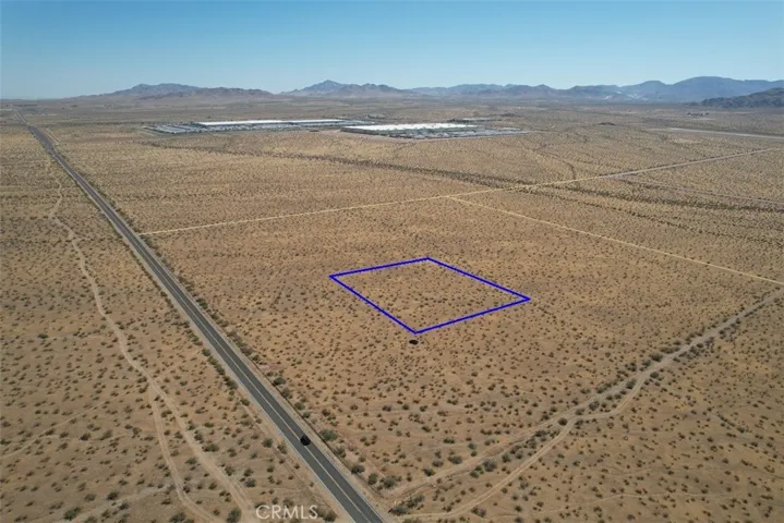 Dale Evans Pkwy to the left of photo - Looking north toward Walmart/former Big Lots Distribution Centers.