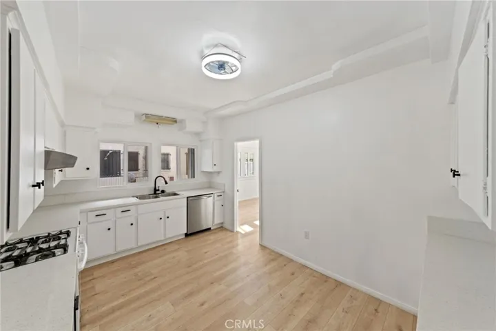 A bright and clean kitchen that perfectly blends modern updates with classic charm.