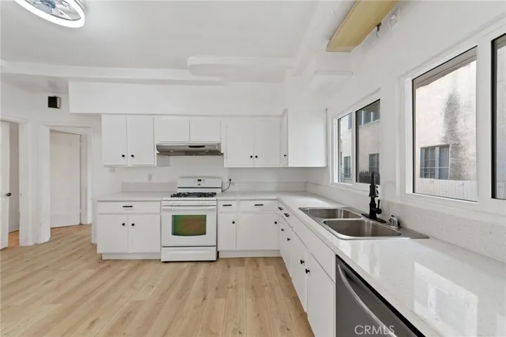 Sink with new faucet overlooks window