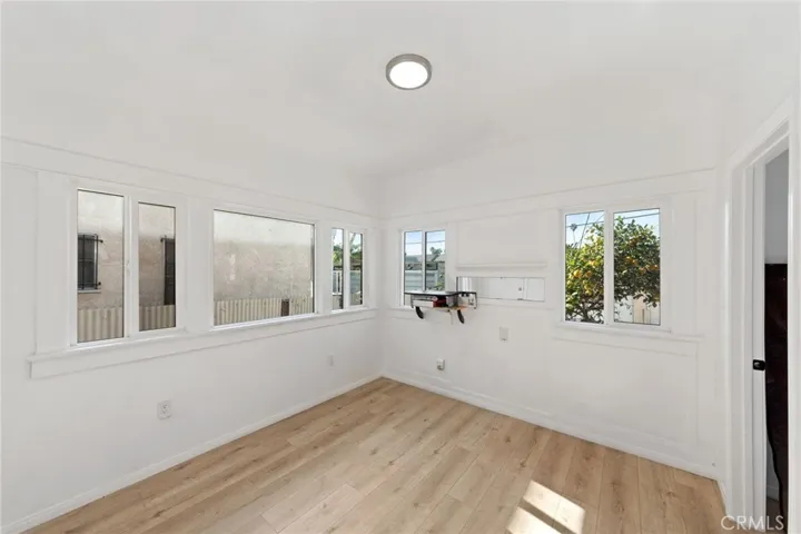 Enclosed porch can easily be a 4th bedroom with its own separate entry in the main house